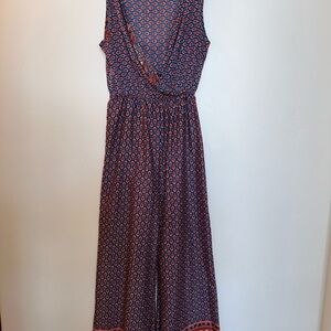 Elegant Blue and Red Polka Dot Jumpsuit with Wrap V-Neck